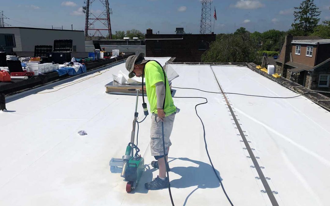 Should You Replace a Flat Roof If You’re Planning to Sell Your Building Next Year?