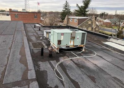 Assess Extent of Roof Damage | Severely Damaged Flat Roof | getflatroofing.com