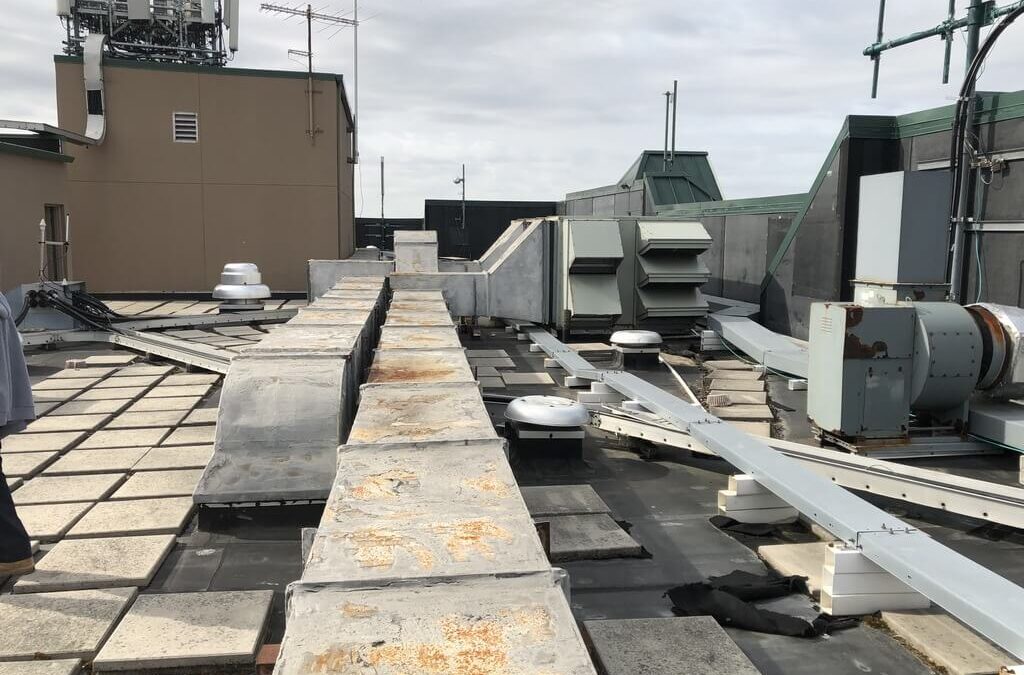 How Rooftop Equipment Can Affect the Cost of Your Commercial Flat Roof