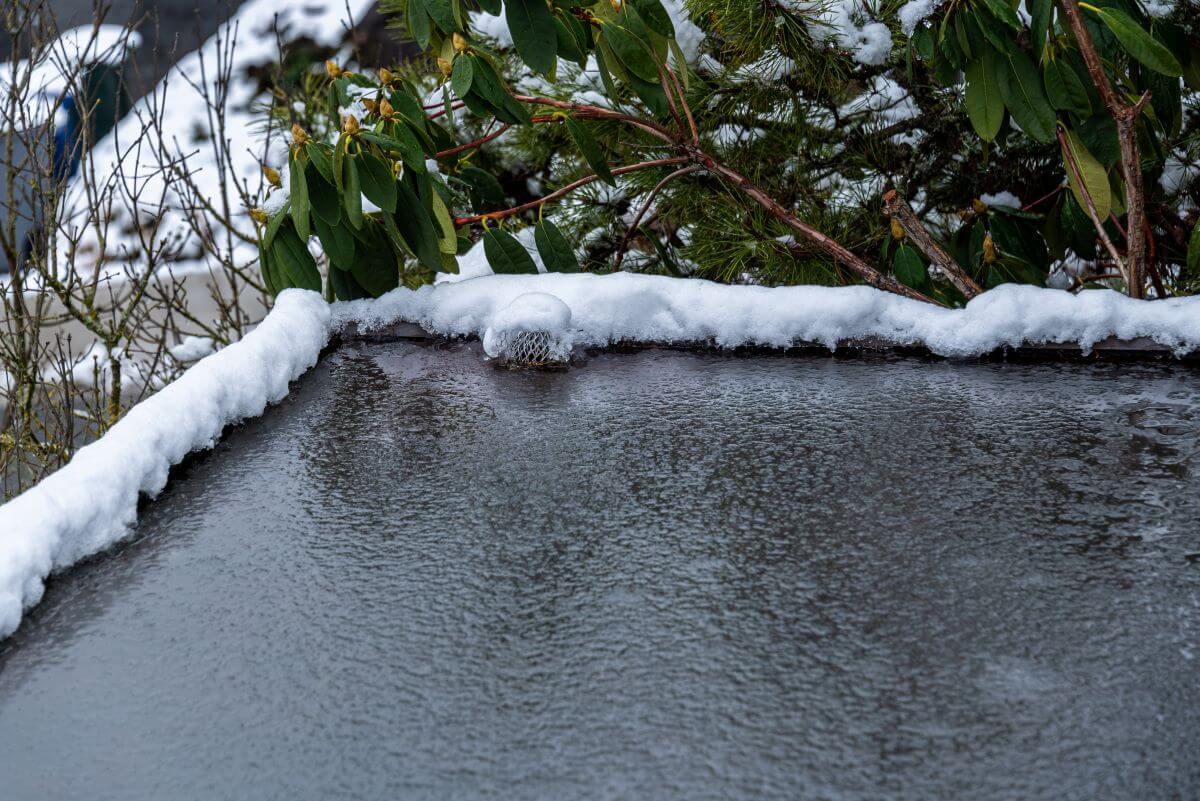 Winter Snow and Rain on a Commercial Flat Roof | getflatroofing.com