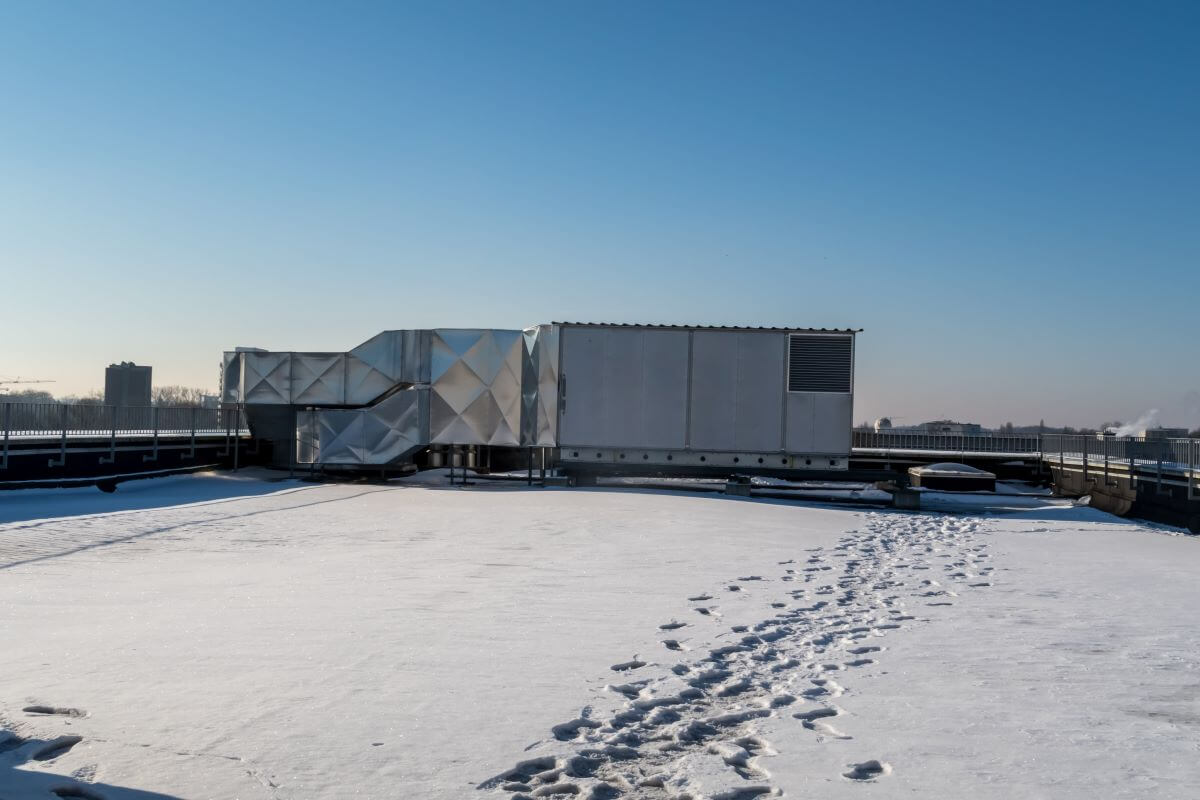 Snow and Ice on a Commercial Flat Roof | getflatroofing.com