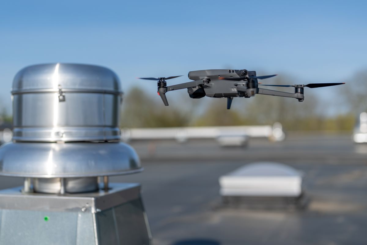 Drone doing flat roof inspection | Flat Roof Solutions