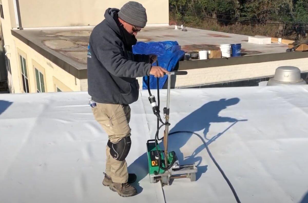 Commercial Flat Roof Being Replaced in the Winter | Flat Roof Solutions 